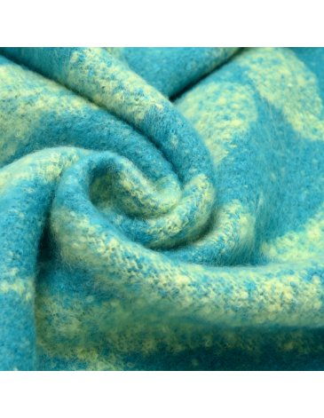 Ruana diseño geometrico con flecos - SKORA